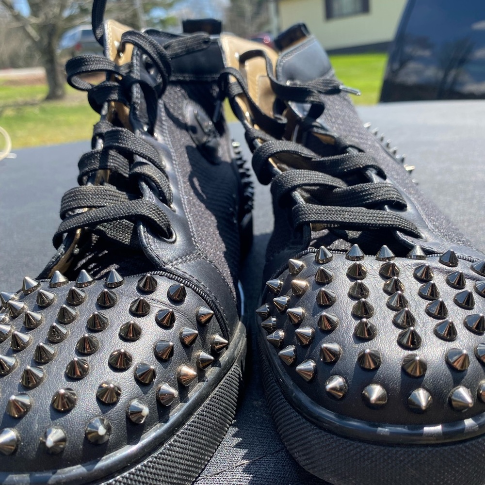 Black with spikes and red bottoms